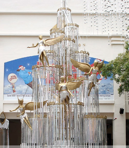 Shiny Christmas tree with angels at Bugis Junction