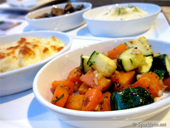 Sautéed mushrooms, mashed potatoes, sautéed vegetables and potato gratin