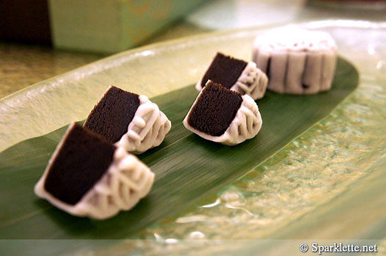 Mini dragon almond snowskin mooncake with black sesame paste