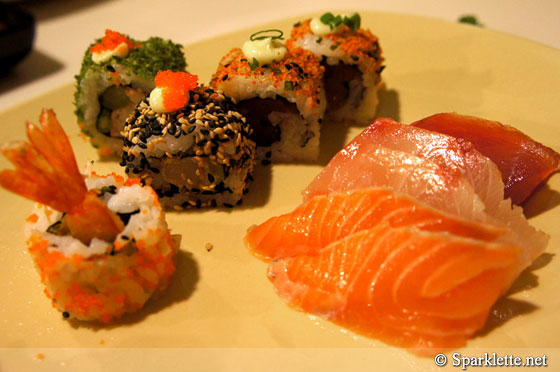 Assorted maki and sashimi