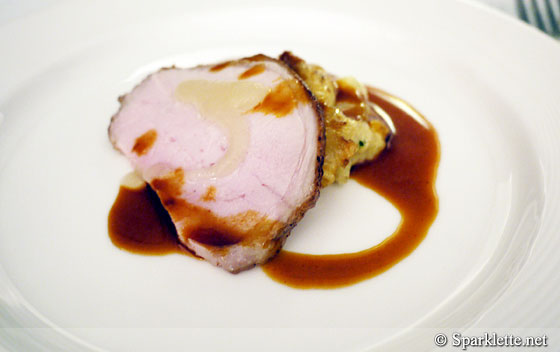 Slow roasted rack of pork with potato gratin and apple sauce