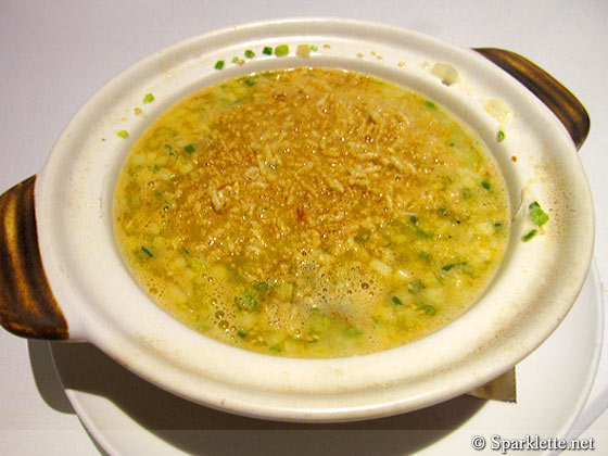 Poached crispy rice with fresh crab meat in superior broth