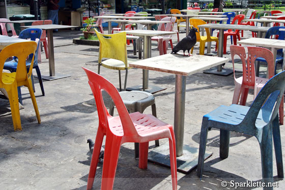 Colourful plastic chairs (captured on Nikon 1 J1 compact camera)