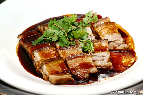 Braised kong bak pork belly with herbs and spices