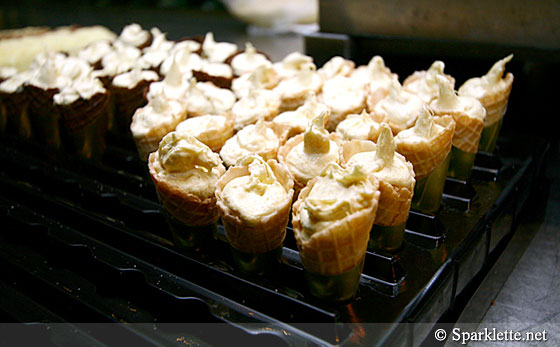 Mini chocolate or vanilla waffle cones filled with durian mousse at Goodwood Park Durian Buffet, Singapore