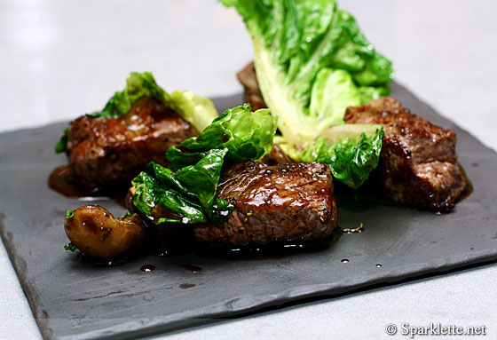 Char grilled Wagyu 'cubes' cooked in hay