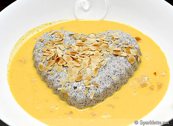Chilled black sesame pudding with mango sauce