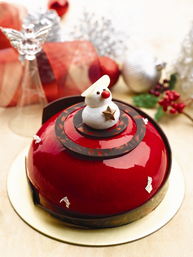 Red Christmas cheese dome with cherry gelee, pistachio and almond sponge cake