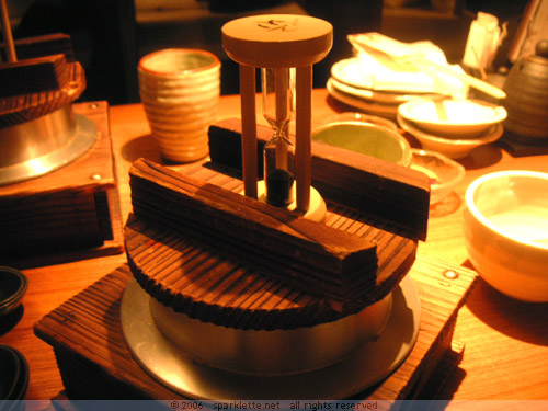 tiny hourglass set atop dish