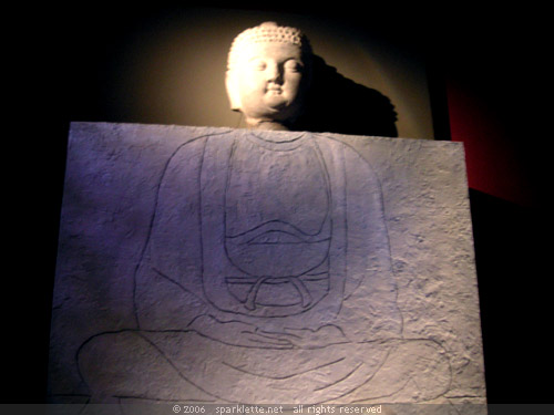 Monumental Buddha missing its torso