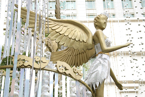 Shiny Christmas tree with angels at Bugis Junction