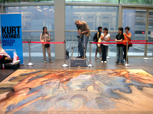 Kurt Wenner taking a photo of his work