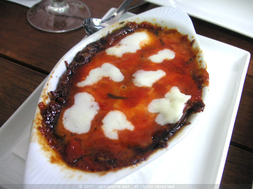 Melanzane alla Parmigiano (Eggplant layered with mozzarella, tomatoes, parmesan cheese and basil)