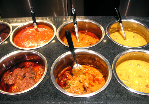 An assortment of Indian curries and gravies