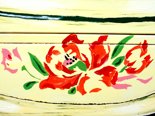 Floral designs on Antique Food Container Postbox