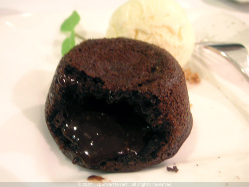 Dark lava chocolate gateau with vanilla ice cream