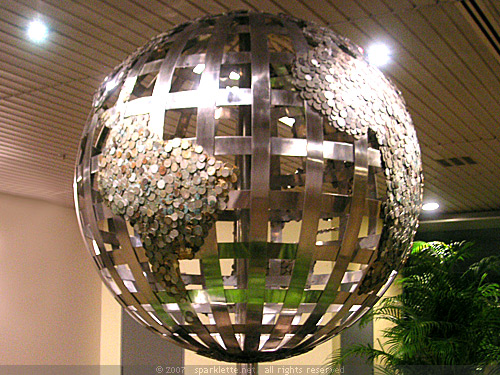 Globe crafted from coins