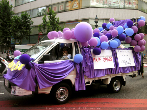 Gay parade, truck with purple balloons