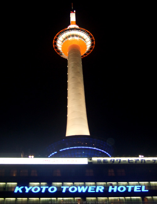 Kyoto Tower at night as seen from Kyoto Station