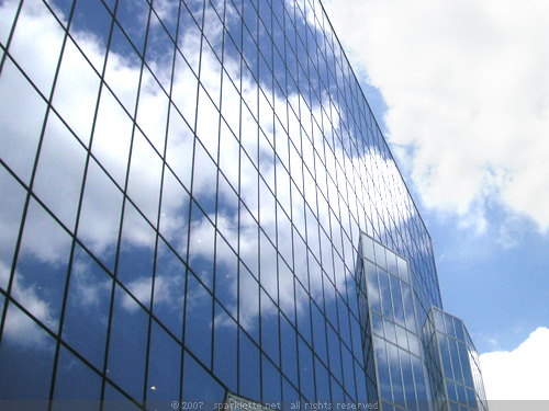 Cloud reflection on glass facade at Kyoto Station