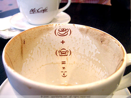 Coffee cup with symbol imprints