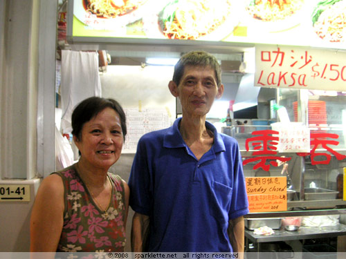 Couple running 50s Wanton Mee