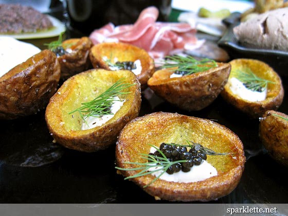 Potato skins with sour cream and ocean trout caviar