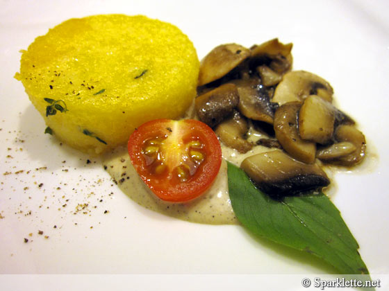 Sauteed mushroom with Polenta and saffron cream sauce