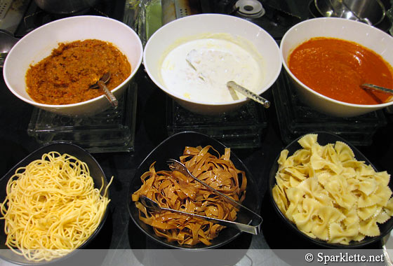 Varieties of Pasta with salmon, squid, prawns, mussels and mushroom sauce