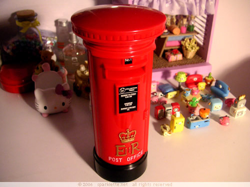 Safety bank in the shape of a red pillar box